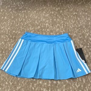 Adidas Blue Pleated Mid Rise Skort with White 3 Stripes on each side. Size L(14)
